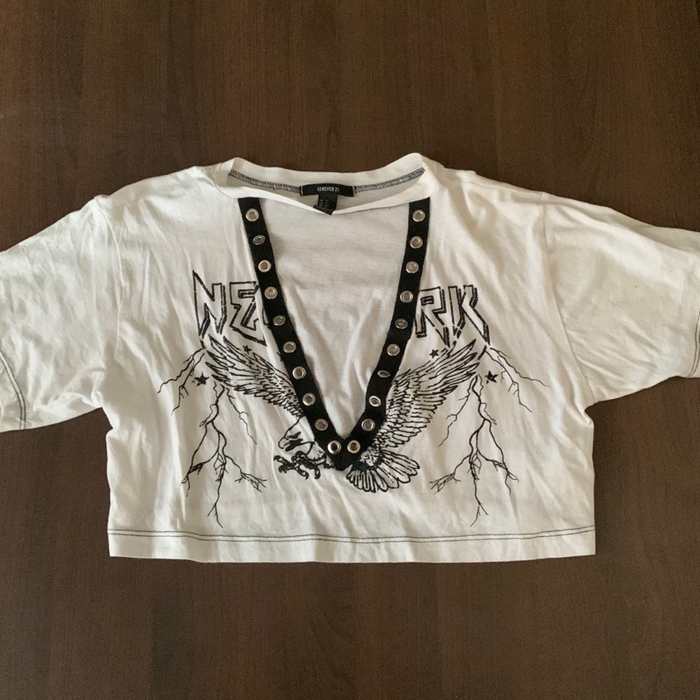cropped white shirt, it’s open from the front so will need a undershirt/bandeau